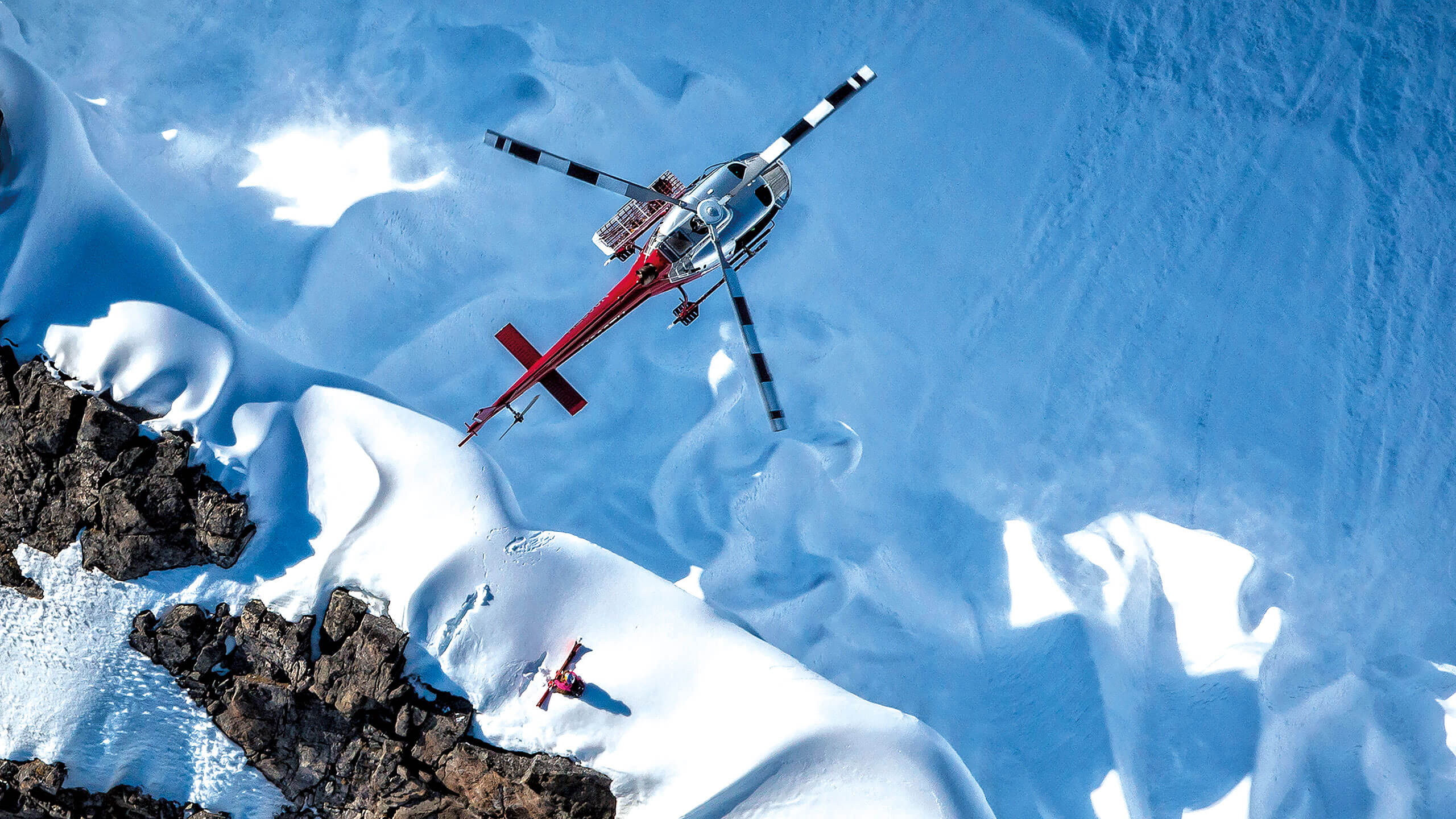 helicopter over mountains