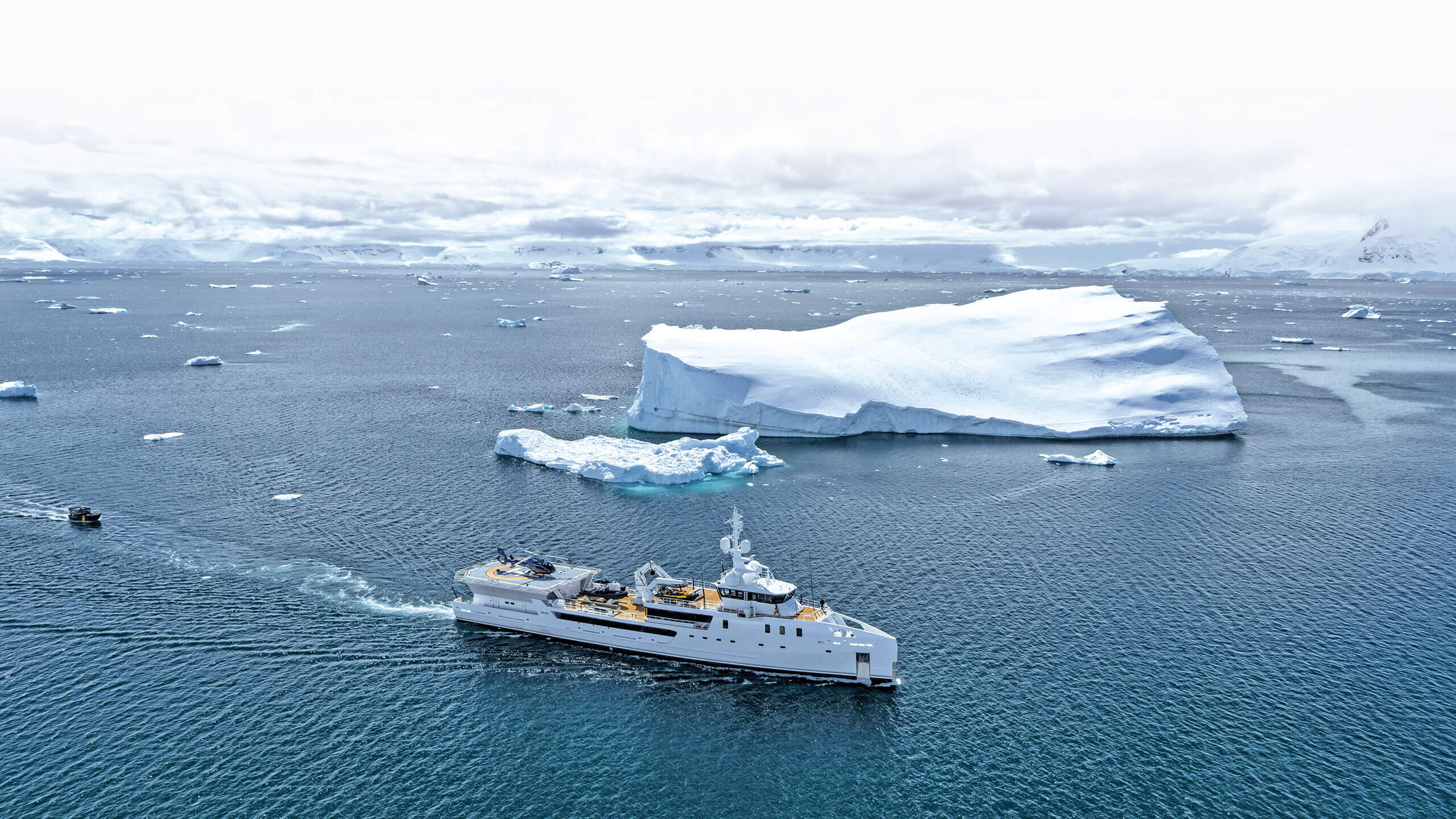yacht near iceberg